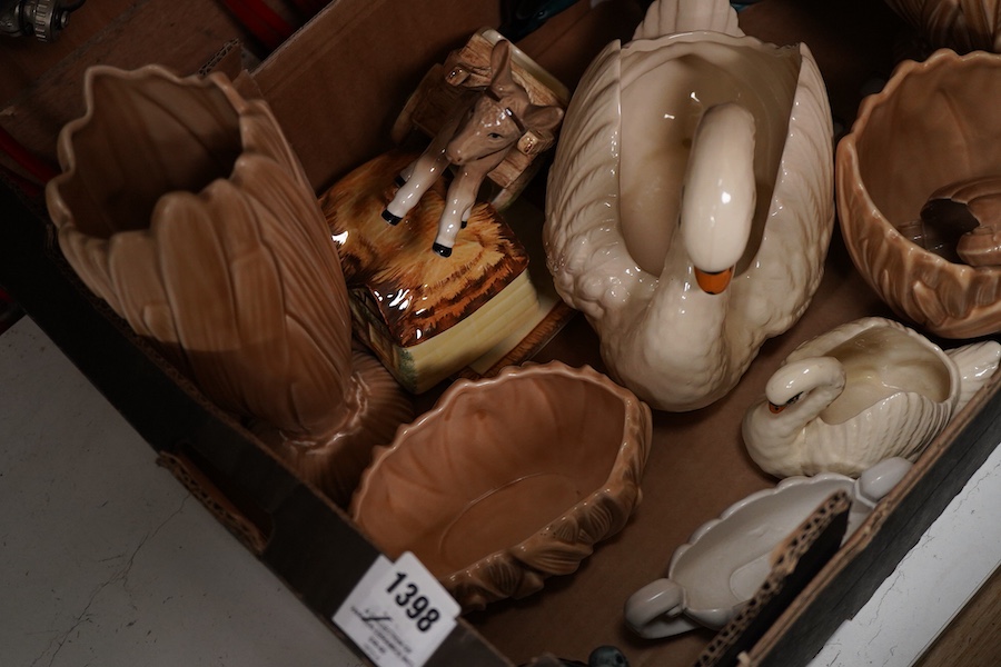A collection of various ceramics including Sylvac hyacinth vases, Poole pottery dolphins, Dartmouth swan planter, etc